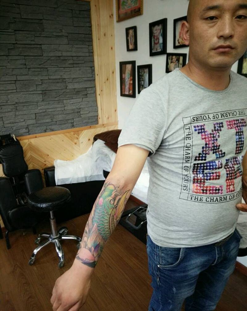 百变鱼纹身图片