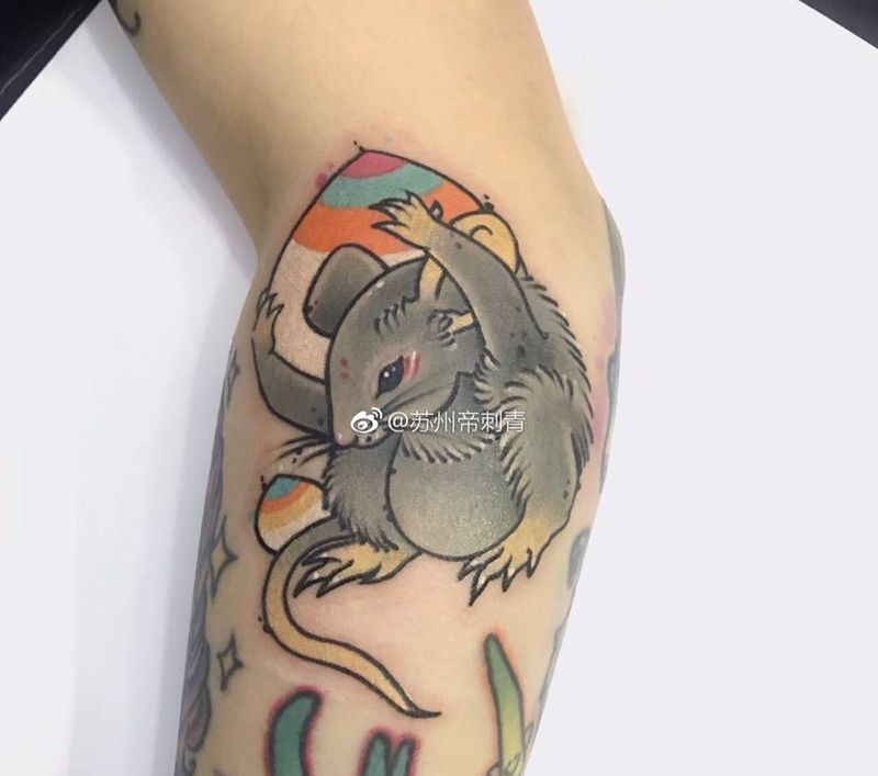 吐宝鼠纹身图片