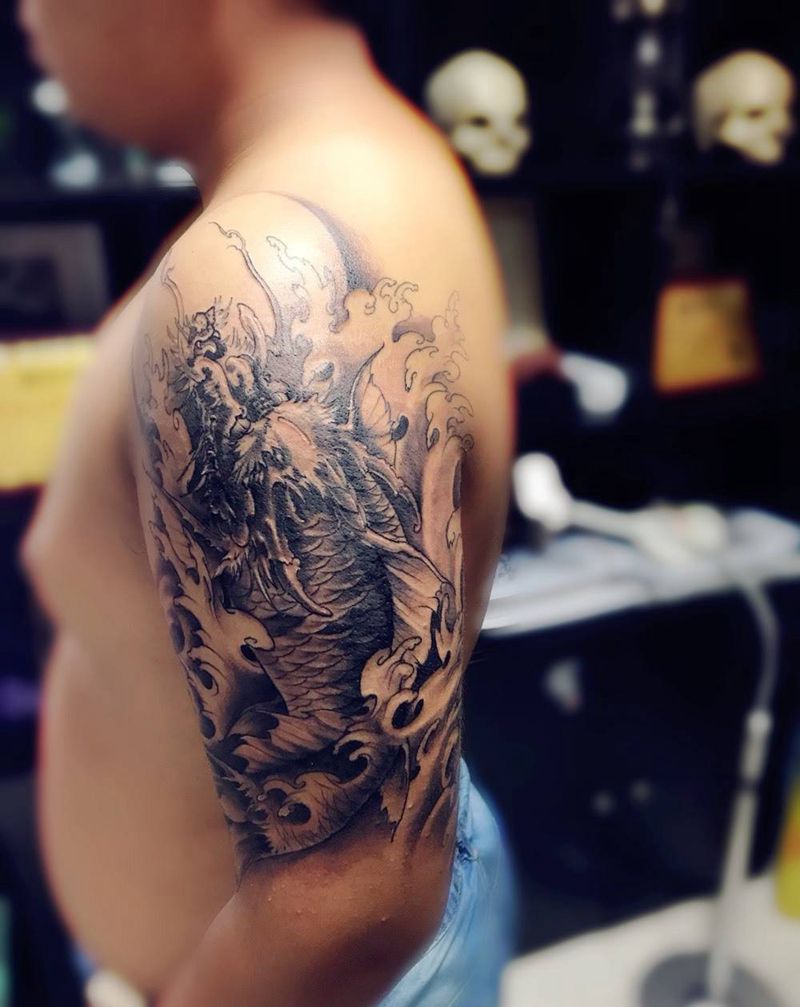 大臂 熬鱼纹身图片