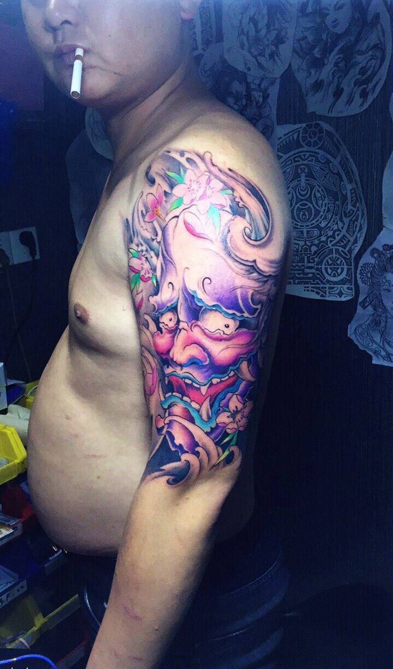 大臂般诺纹身图片