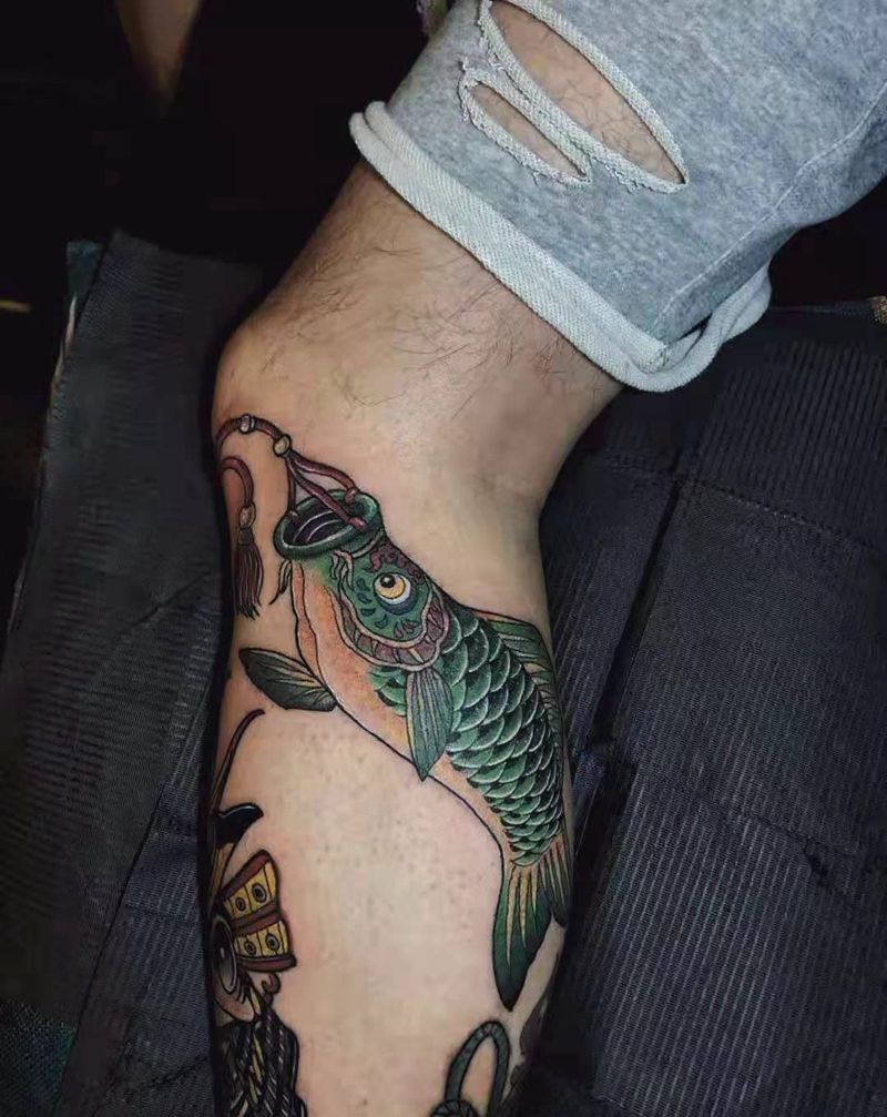 鱼旗纹身图片_腿部老传统纹身图案