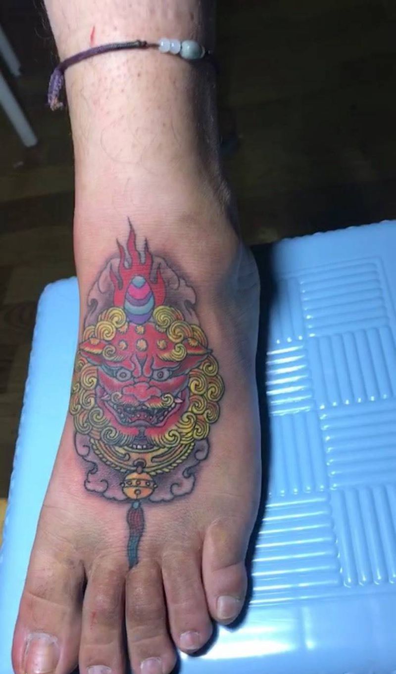 脚面唐狮纹身图片