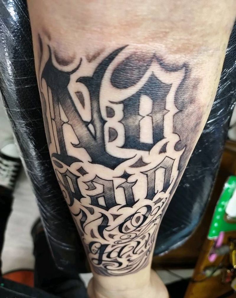 花体字纹身图片_手臂花体字纹身图案