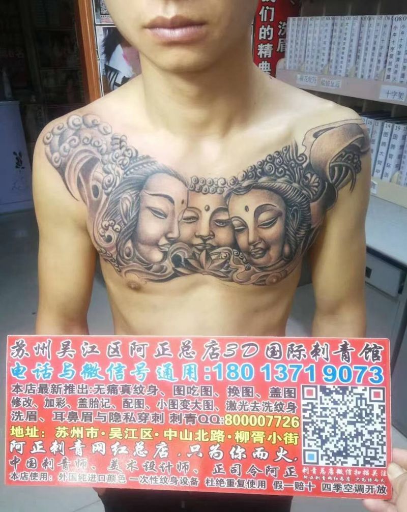 胸口三面佛年兽立体纹身图片_胸部手臂新传统水墨三面佛年兽纹身图案