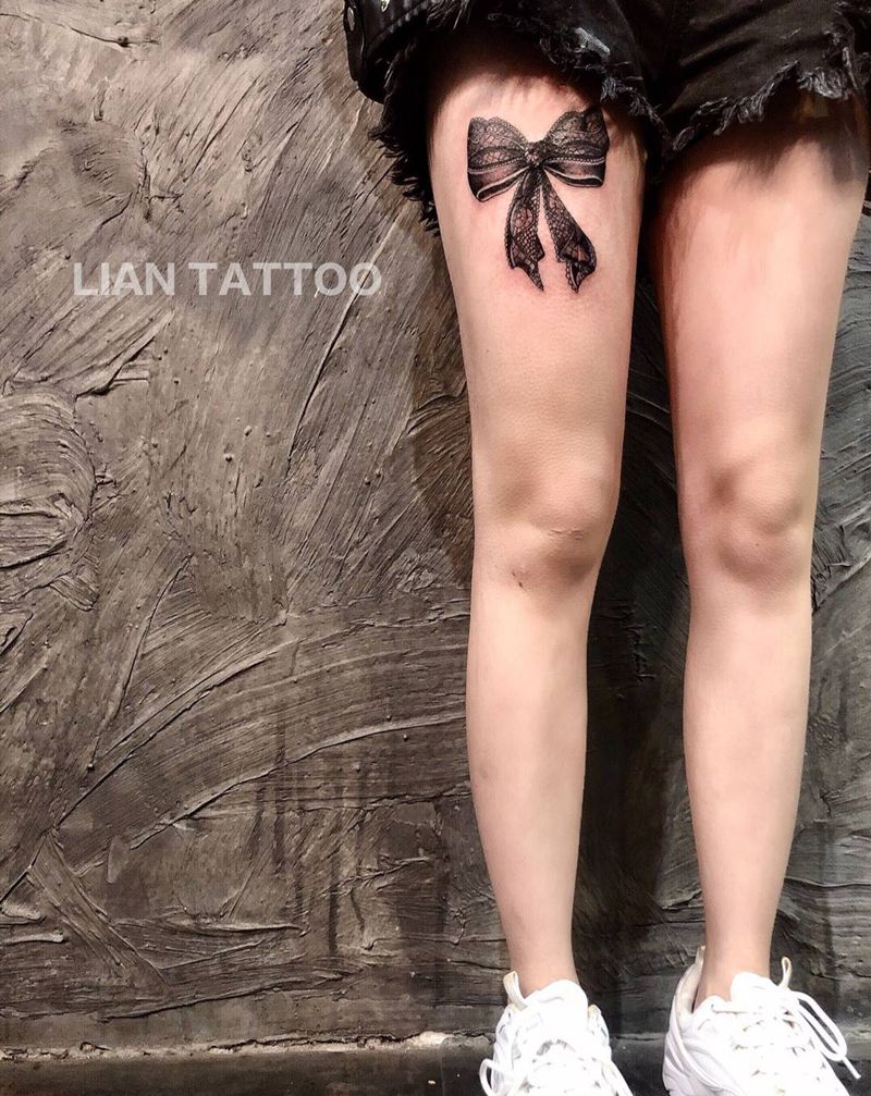 蕾丝蝴蝶结纹身图片_腿部欧美写实纹身图案