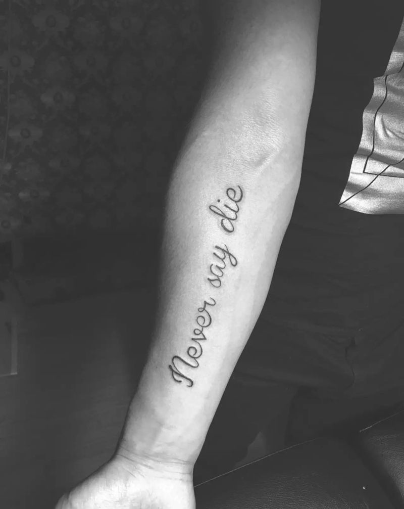 永不言弃纹身图片_手臂成品欧美纹身图案