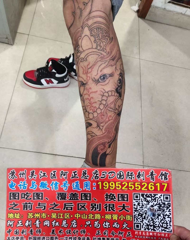 象神刺青纹身图片_背部腿部新传统欧美写实象神刺青招财纹身图案