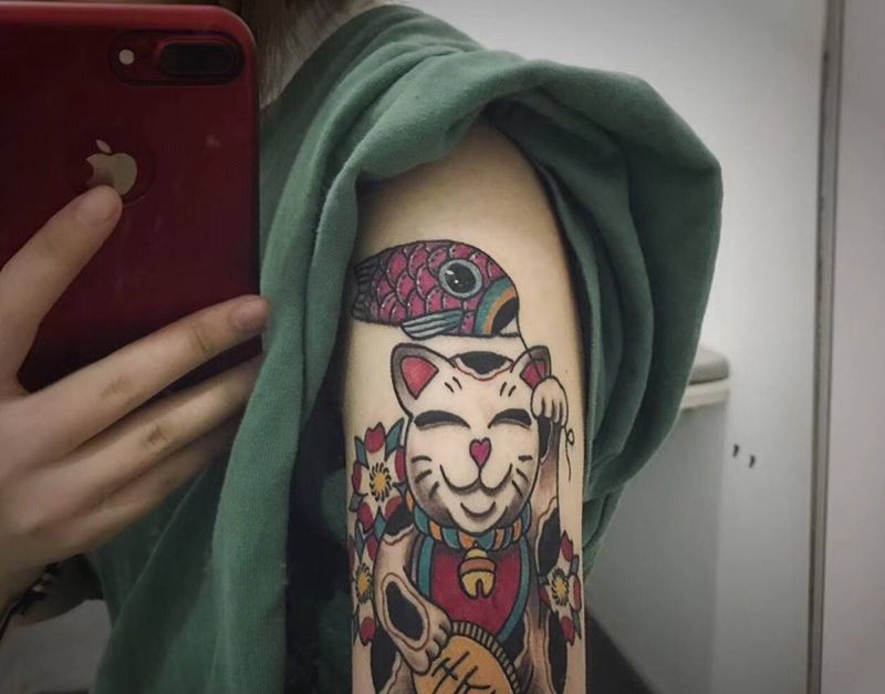 招财猫，客户一年后图纹身图片