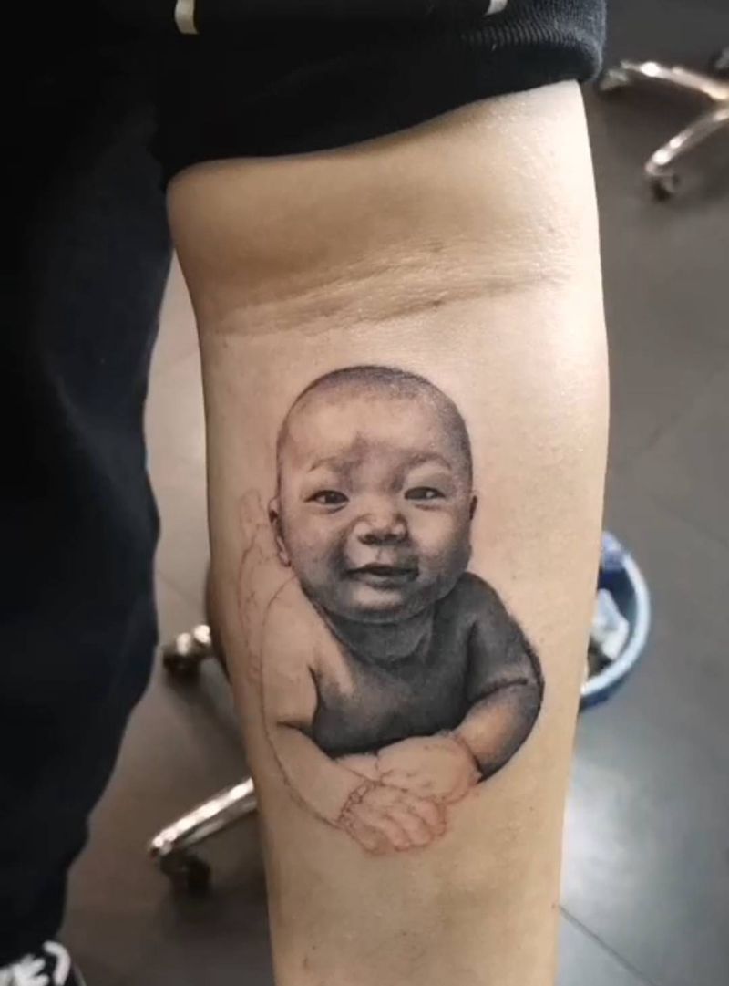 小朋友肖像纹身图片_手臂欧美写实纹身图案