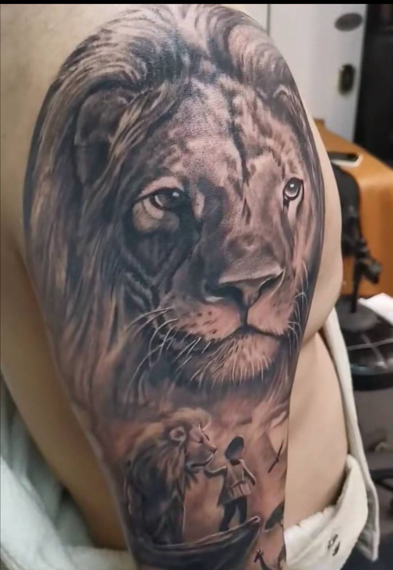 狮子歌歌纹身图片_手臂欧美写实纹身图案