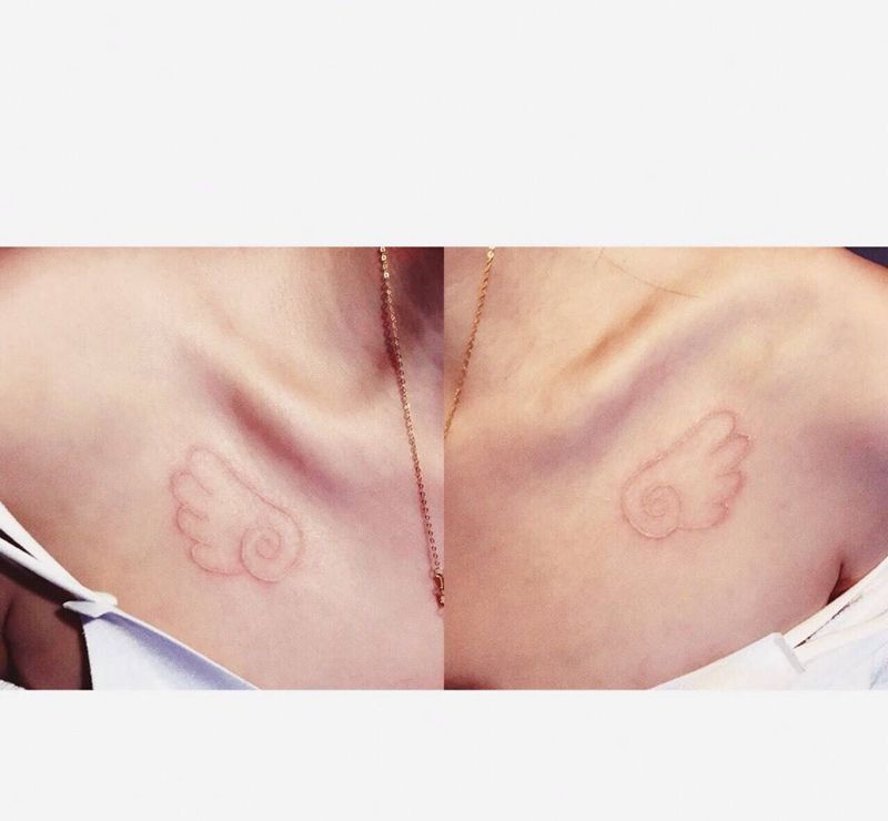 白色翅膀纹身图片