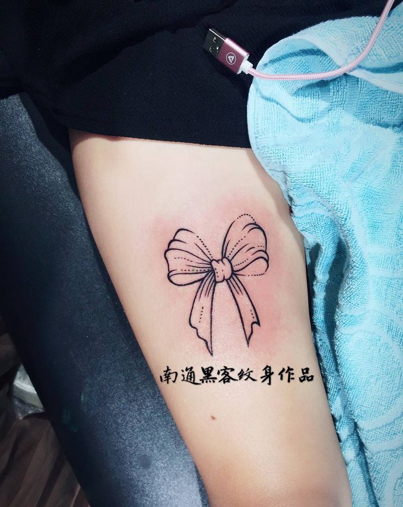 简单蝴蝶结纹身图片