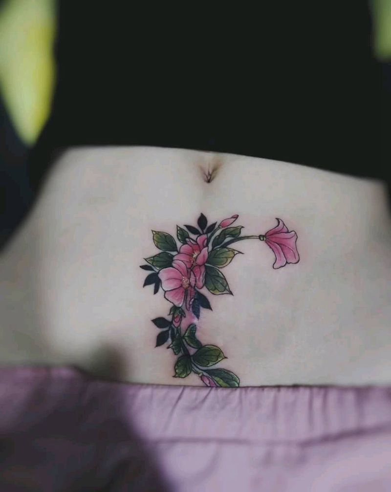 遮盖，疤痕纹身图片_腹部花朵纹身图案