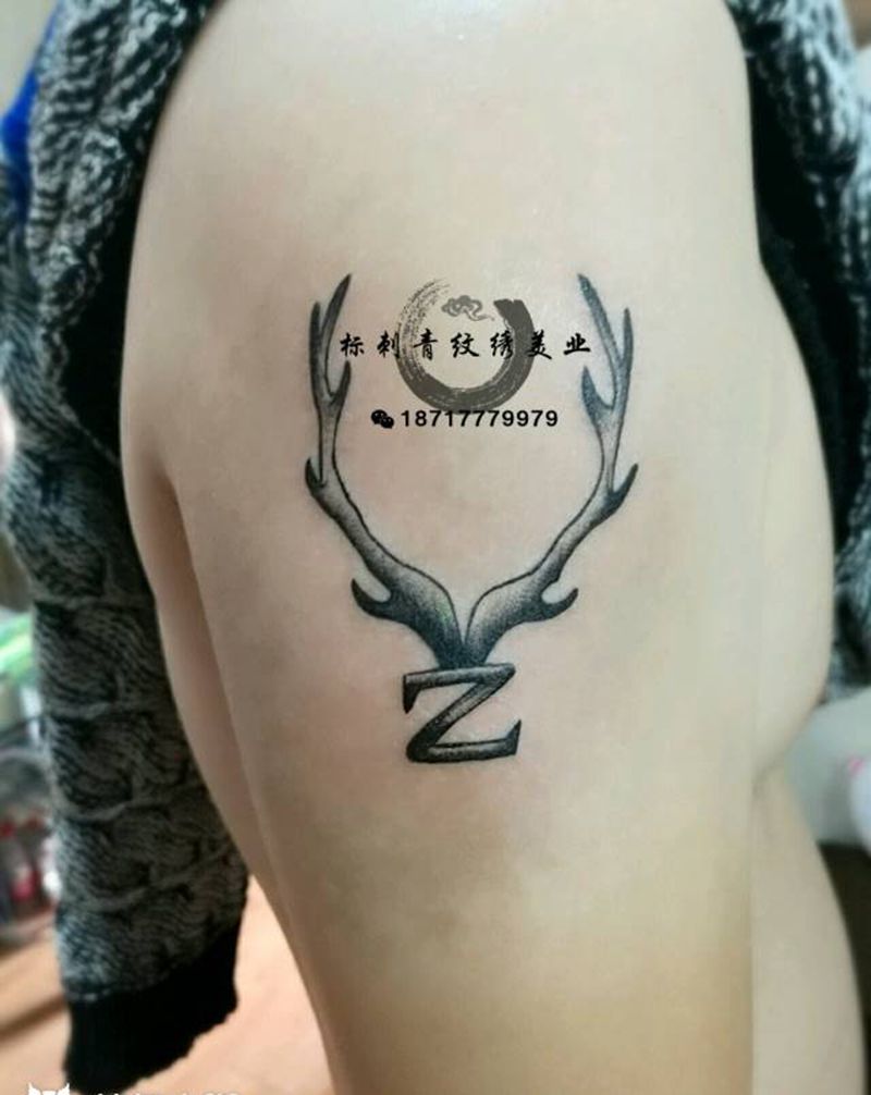 大臂点刺鹿角纹身纹身图片_手臂清新图腾点刺成品纹身图案