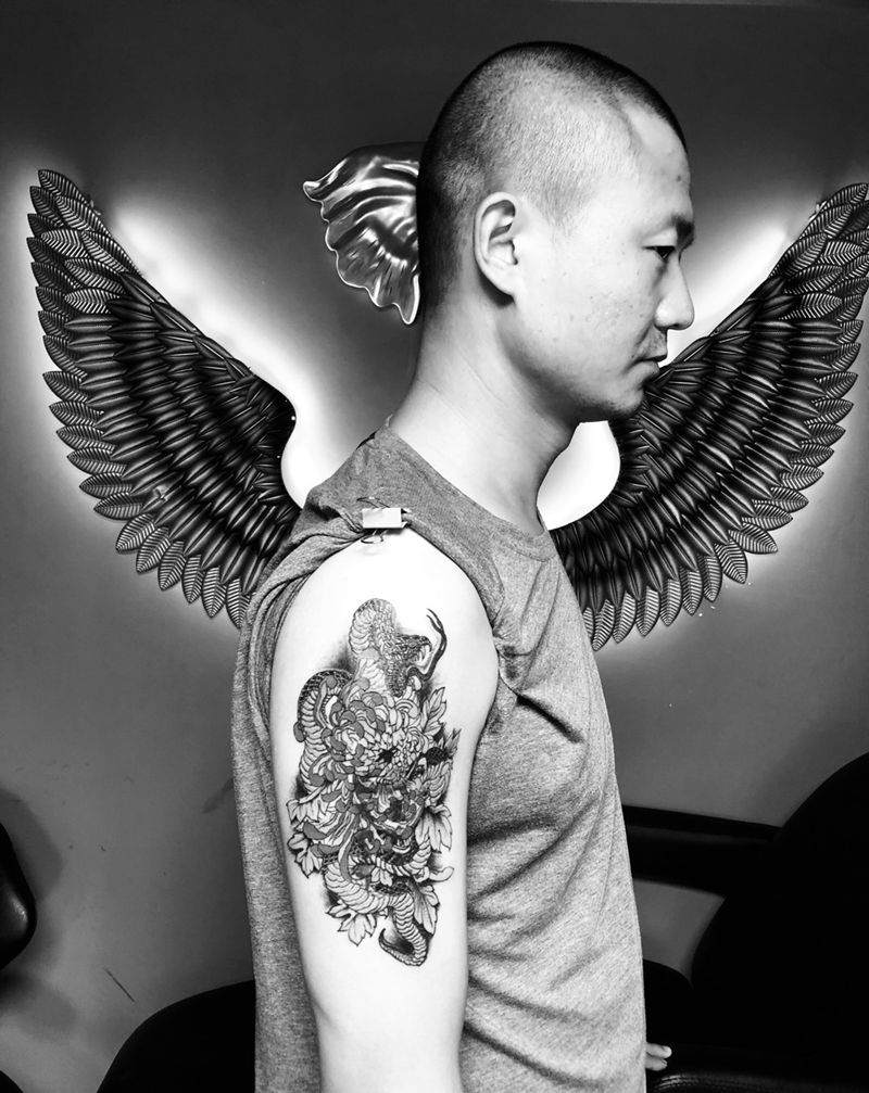 大臂遮盖纹身图片