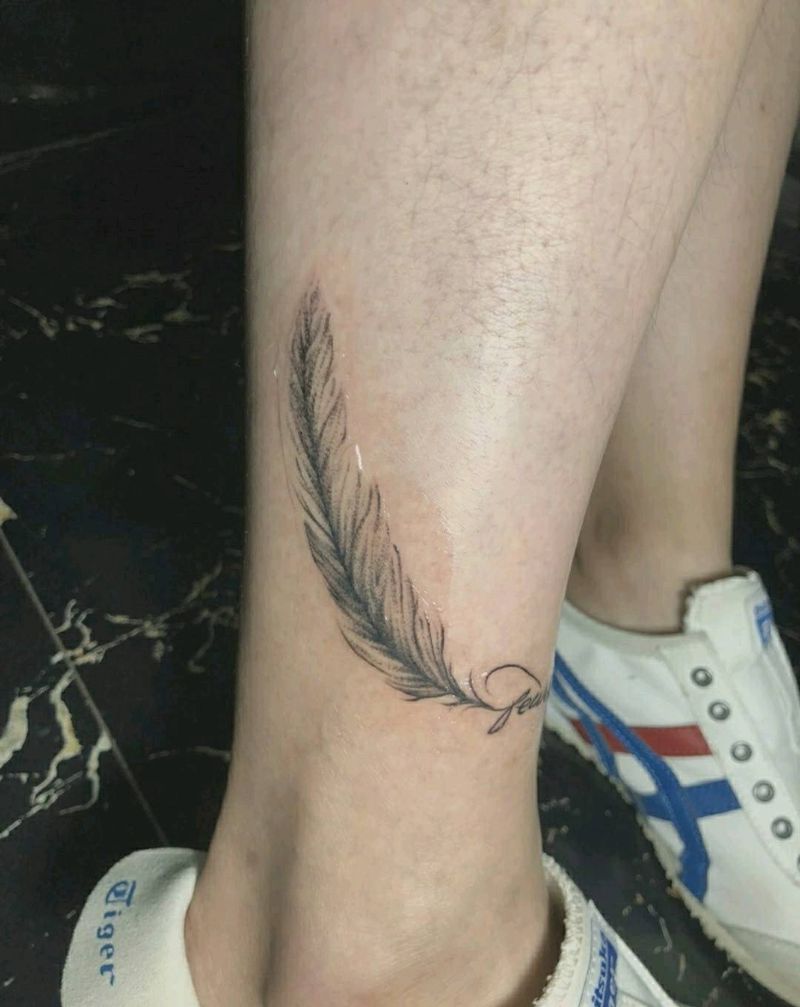 羽毛纹身图片_腿部欧美写实水墨羽毛纹身图案