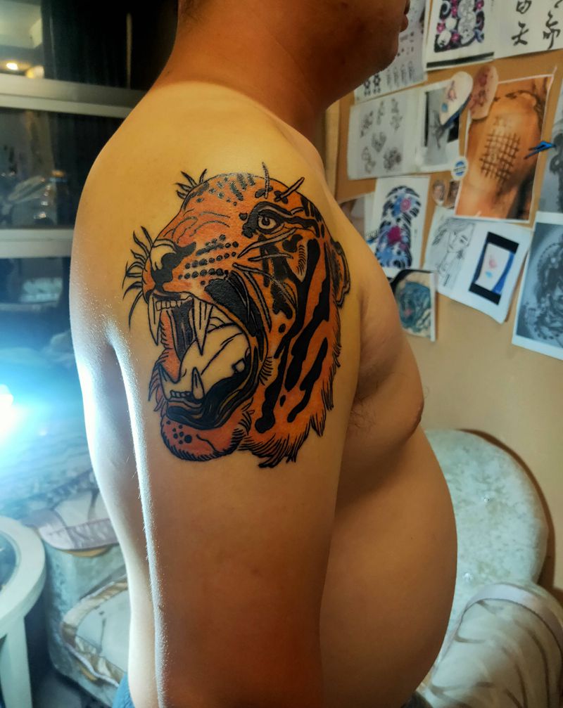 未完成纹身图片_手臂妞妞元素纹身图案