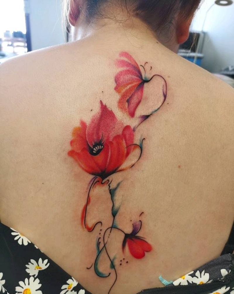 花纹身图片_背部水彩点刺纹身图案