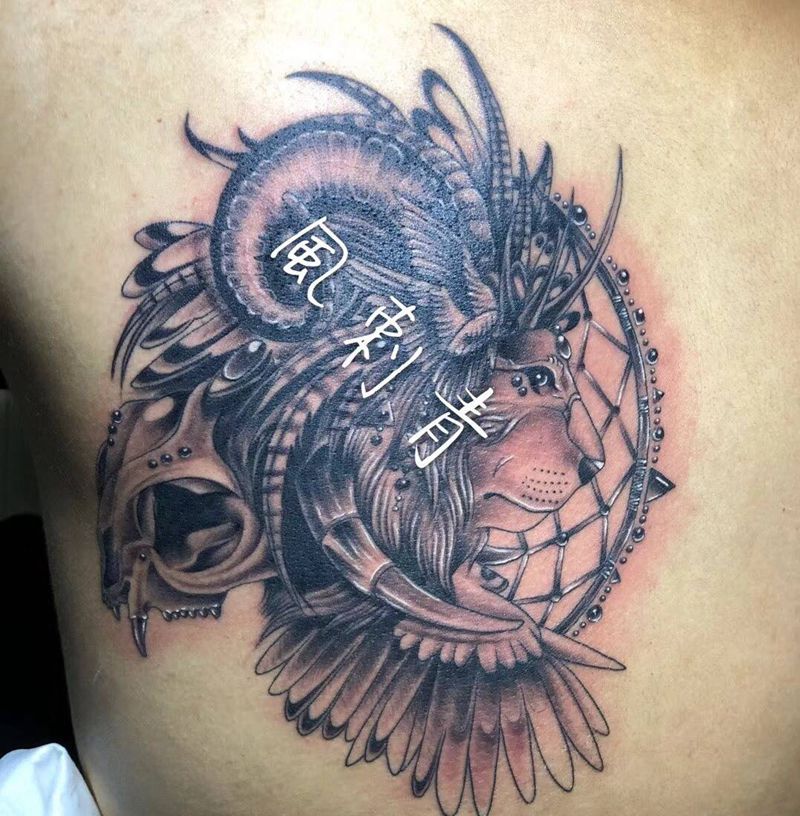 狮子捕梦网纹身图片