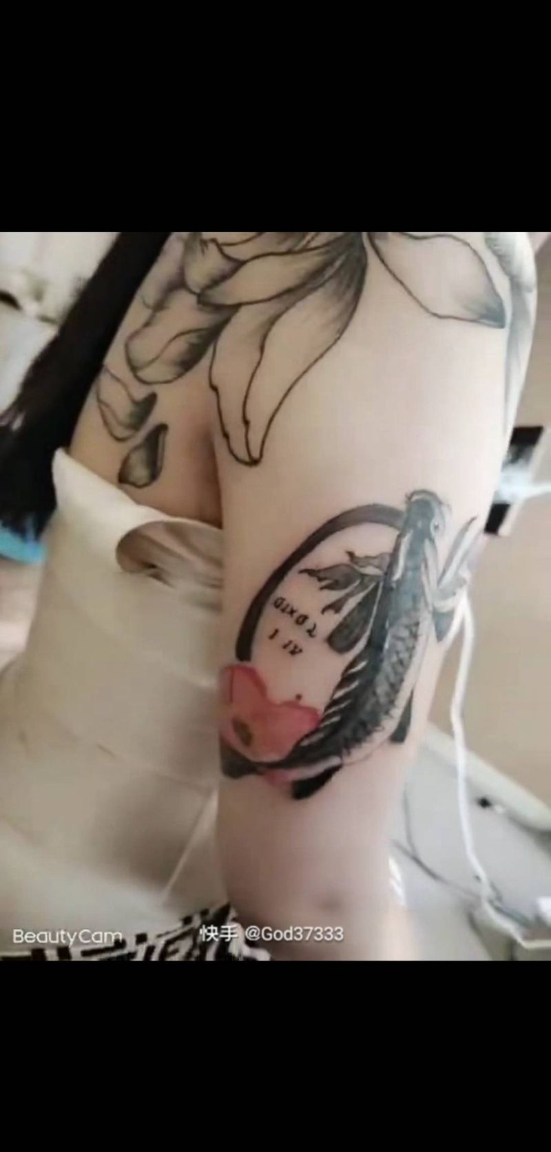 鱼纹身图片_肩部手臂纹身图案