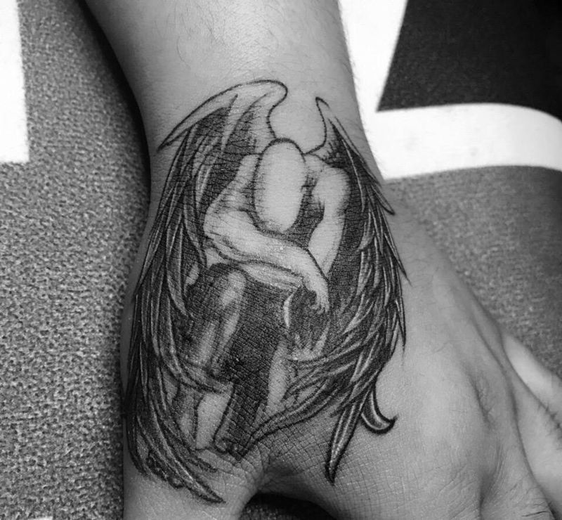 虎口蝎子遮盖纹身图片_成品手部纹身图案