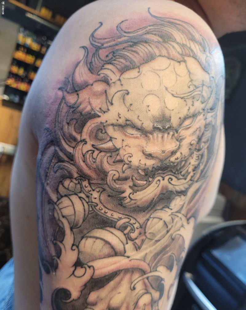 新传统唐狮纹身图片_手臂新传统唐狮纹身图案