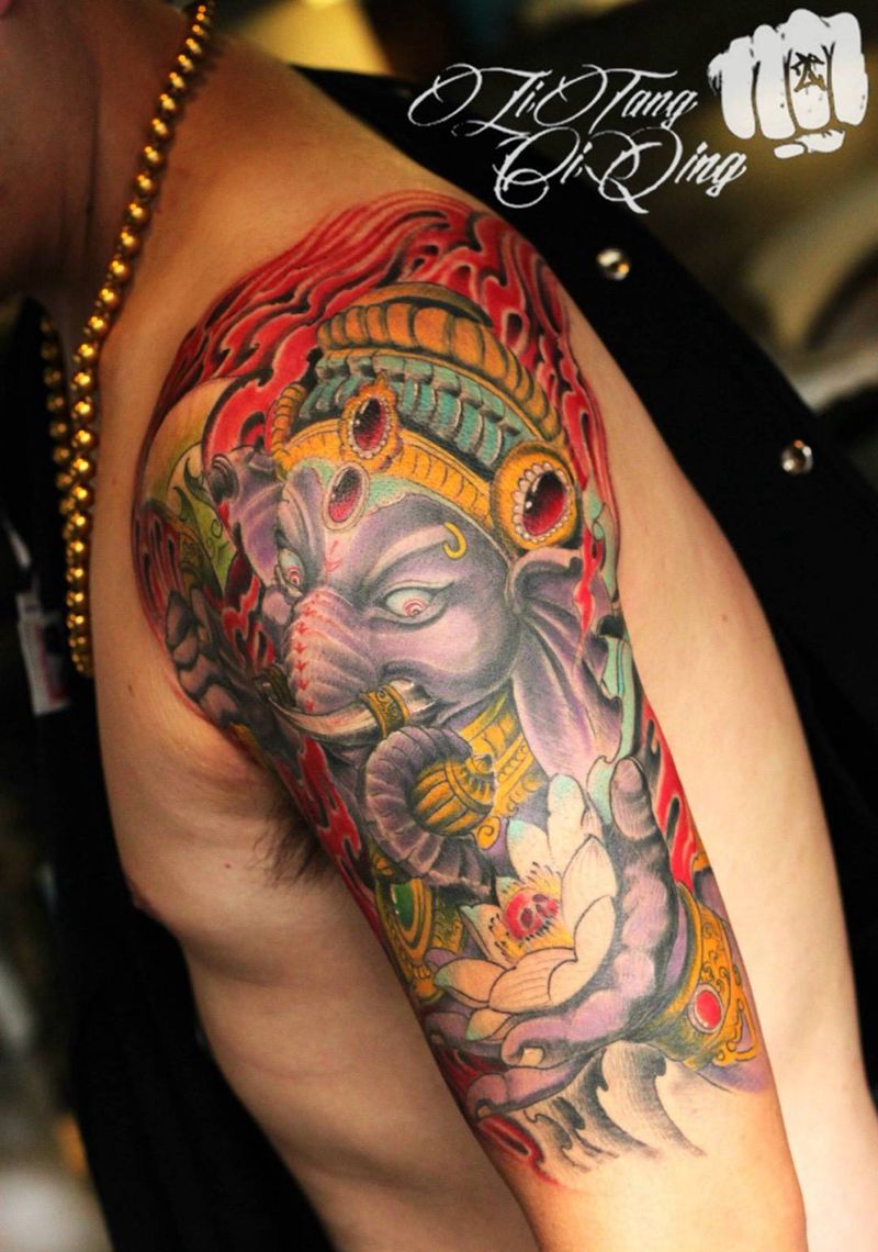 彩色象神一只纹身图片_成品手臂肩部传统习俗动物静物人物鬼神宗教纹身图案