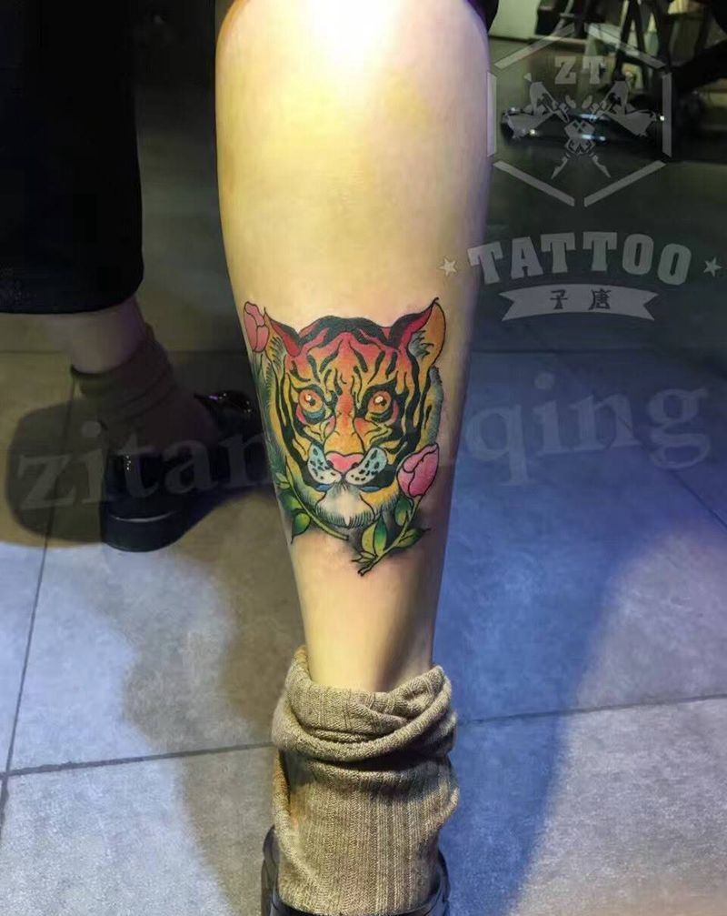 老虎纹身图片_成品腿部动物植物纹身图案