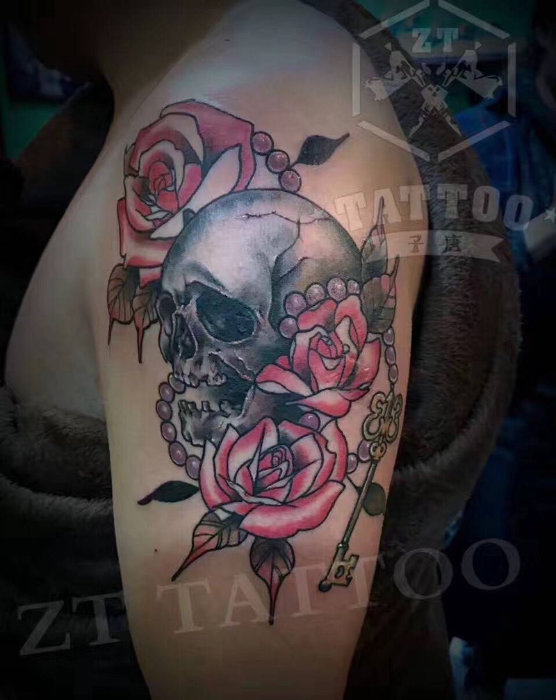 骷髅玫瑰纹身图片_成品手臂植物纹身图案