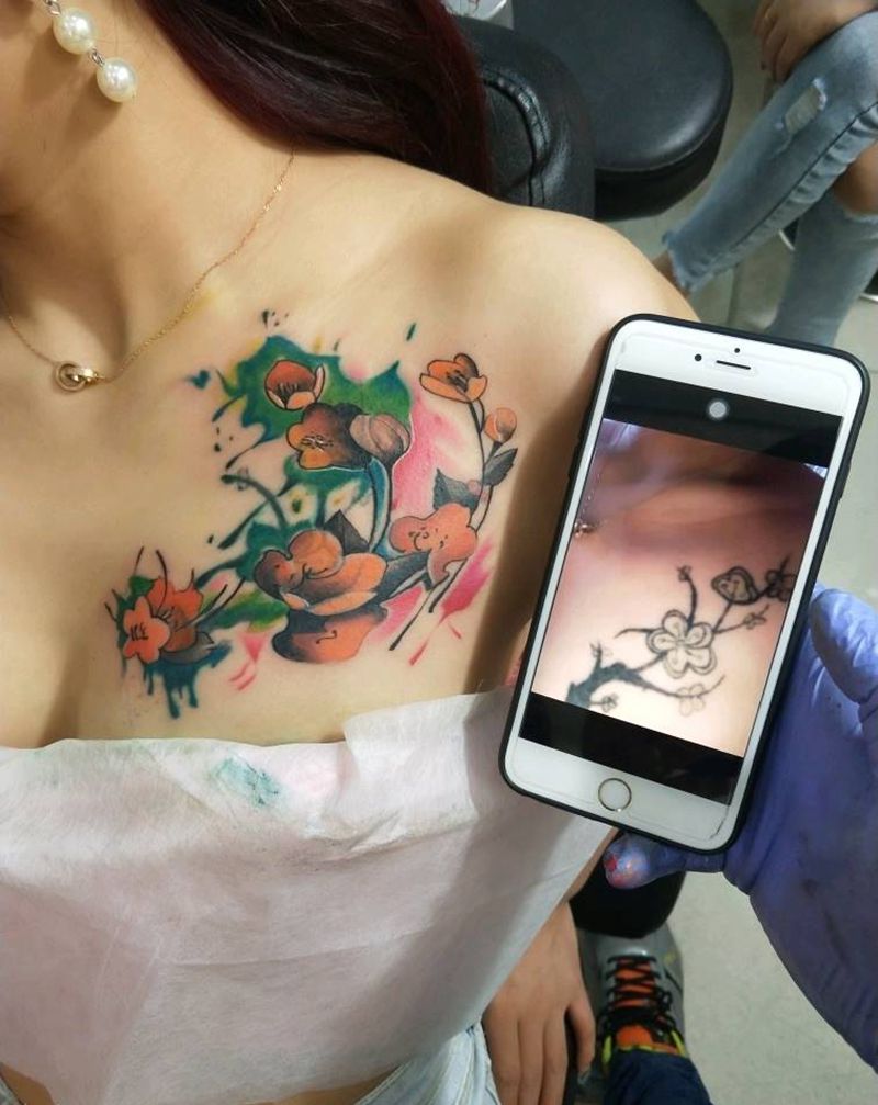 遮盖纹身图片_胸部水彩水墨纹身图案
