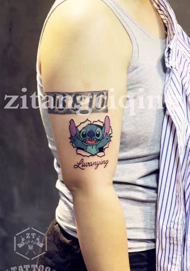 史迪仔纹身图片_成品手臂欧美卡通纹身图案