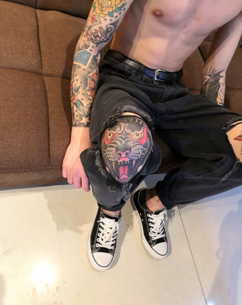 爆膝盖纹身图片_腿部纹身图案