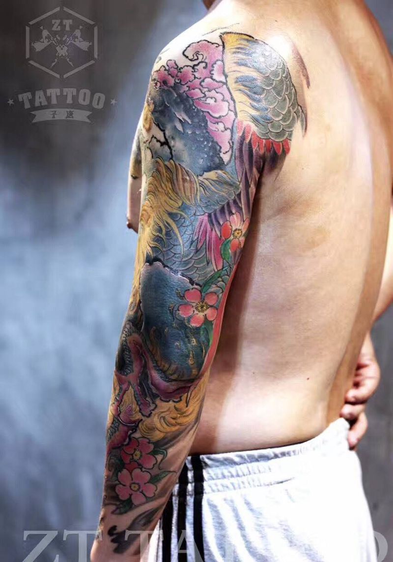 凤凰花臂纹身图片_成品手臂传统动物宗教静物植物纹身图案