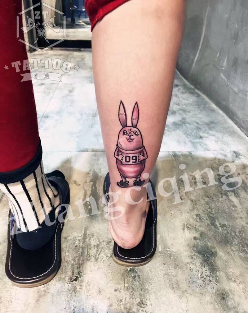 情侣越狱兔纹身图片_成品腿部欧美情侣纹身图案