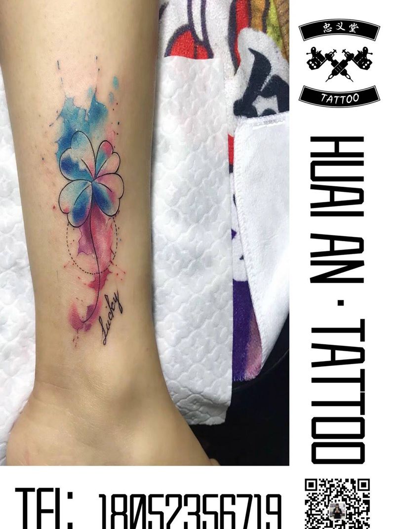 四叶草纹身图片_腿部水彩纹身图案