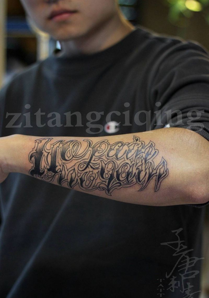 其卡诺花体纹身图片_成品手臂欧美字符原创纹身图案