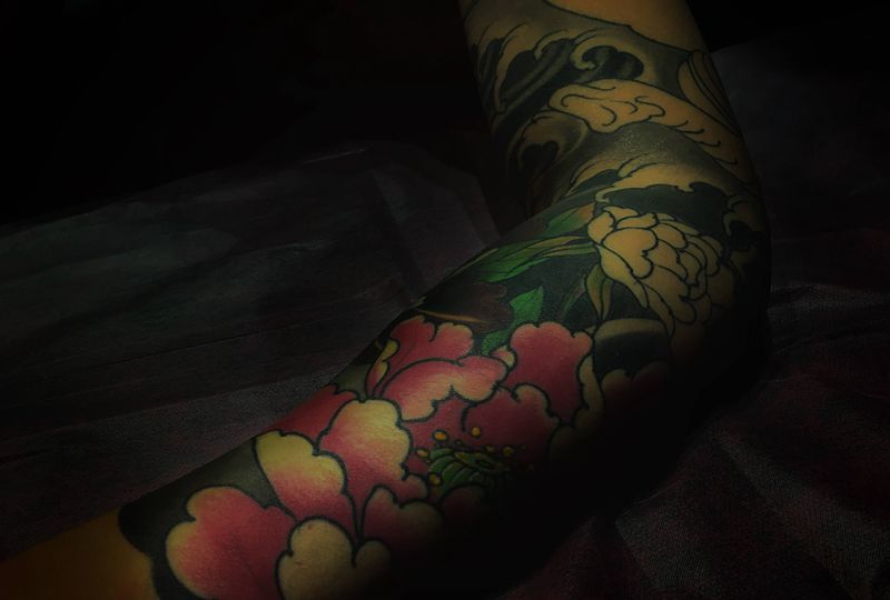 传统象神花臂纹身图片_手臂新传统纹身图案