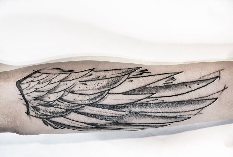 翅膀纹身图片_手臂几何纹身图案