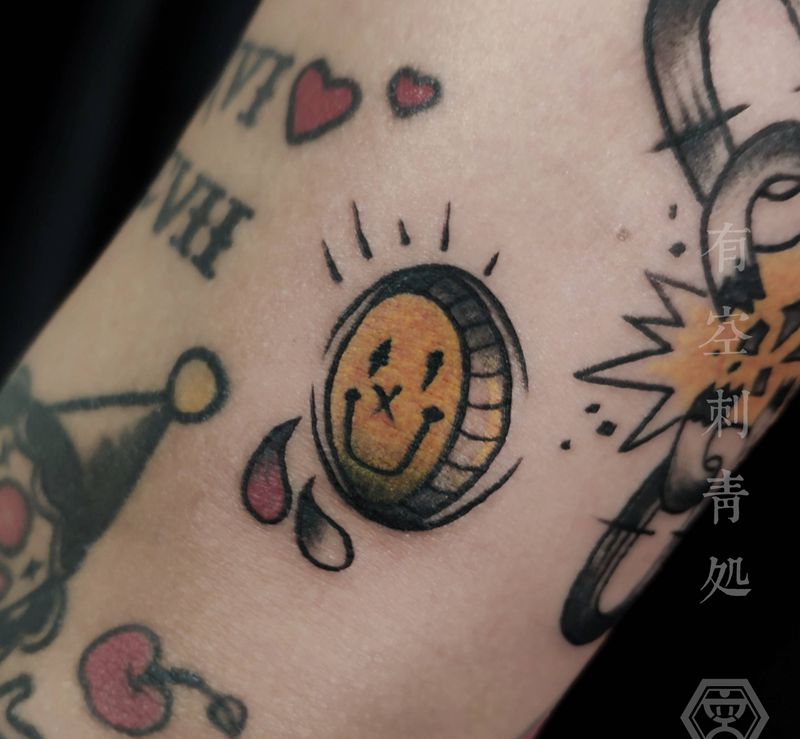 Smiling Coin纹身图片_手臂Old School纹身图案