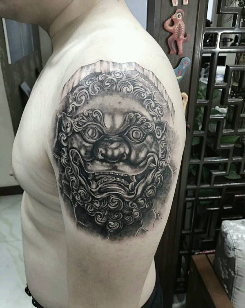 一粒狮子头纹身图片