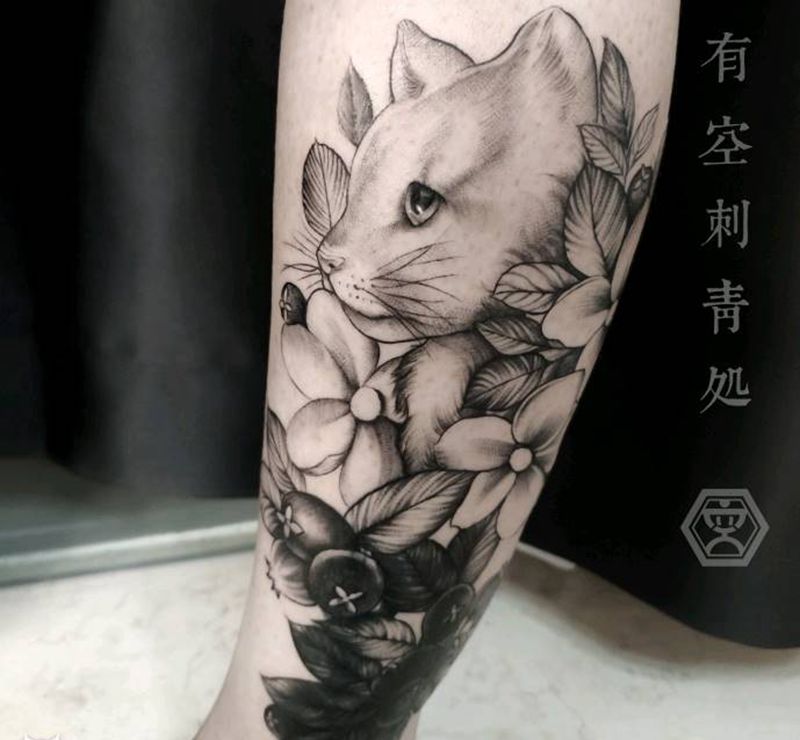 猫咪遮盖纹身图片_腿部点刺纹身图案
