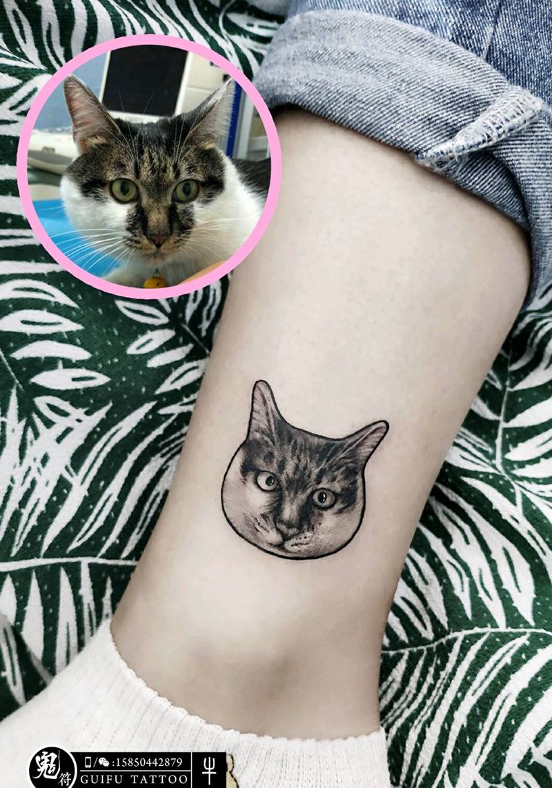 猫纹身图片_腿部欧美写实宠物纹身图案