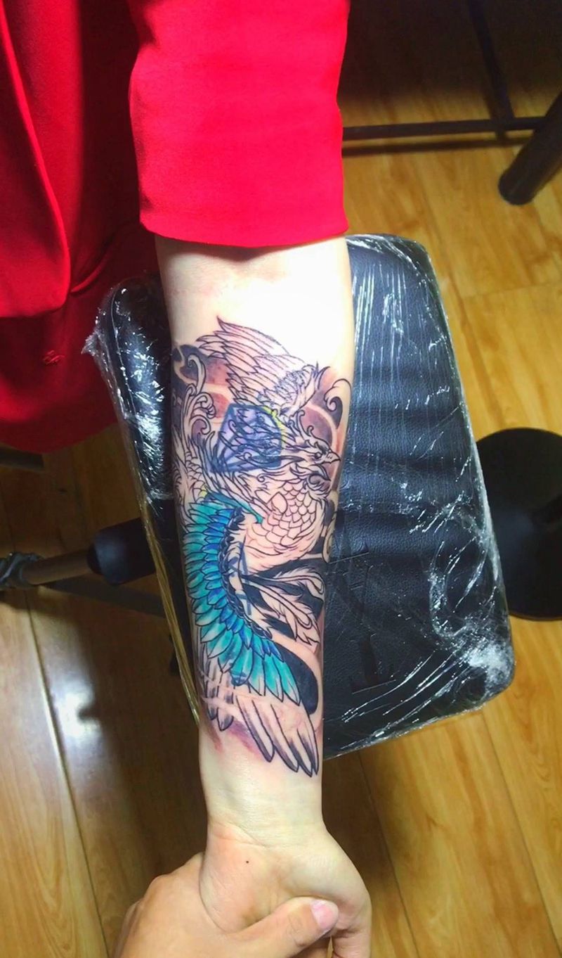 小臂凤凰纹身图片