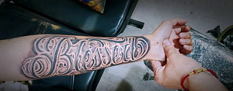 美女纹身图片_手臂纹身图案