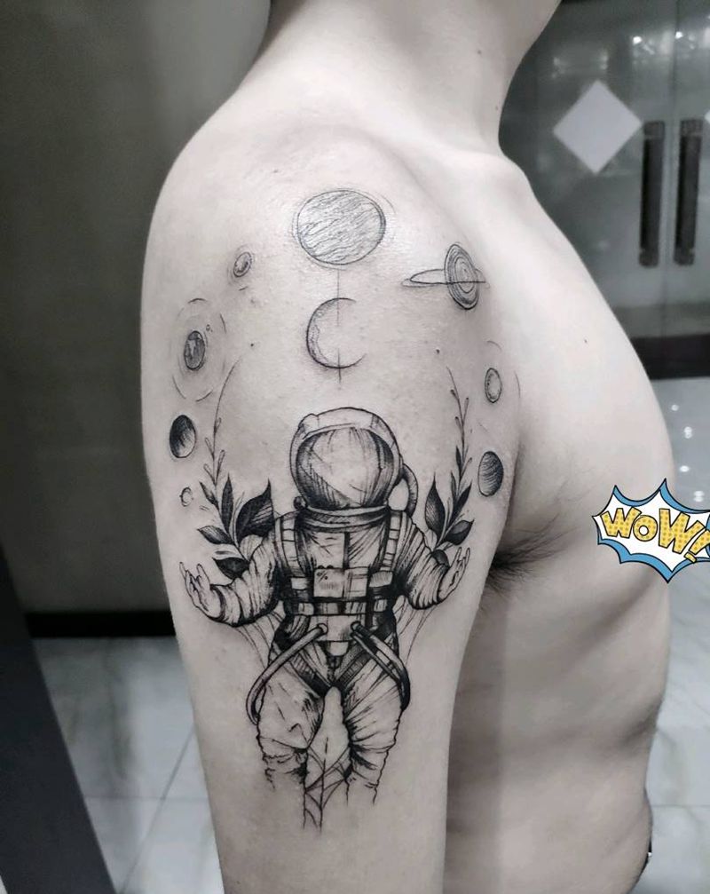 流浪太空纹身图片_肩部手臂点刺几何宇航员纹身图案