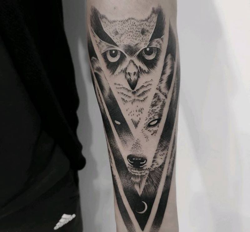 猫头鹰与狼纹身图片_手臂点刺纹身图案