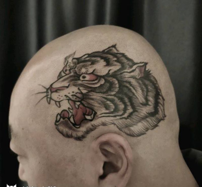虎头虎脑纹身图片_老传统纹身图案