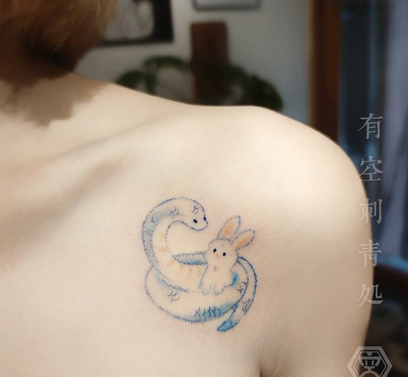 蛇与兔纹身图片_肩部New School纹身图案
