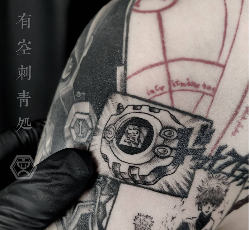 数码宝贝变身器纹身图片_手臂点刺纹身图案