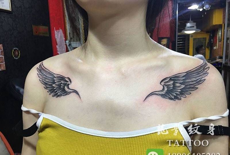 胸口翅膀纹身图片